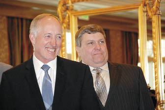 Ritchy Toeves of American Falls, Idaho, has a laugh between takes, while John Meyer of Cohocton, N.Y., poses during the USPB Executive Committee photo shoot